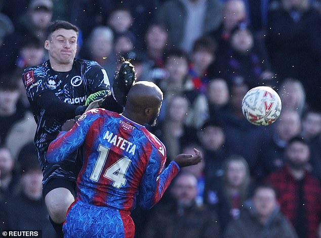 Millwall fans hold APPLAUSE for banned goalkeeper Liam Roberts in Championship clash – in the same minute he hospitalised Crystal Palace striker Jean-Philippe Mateta