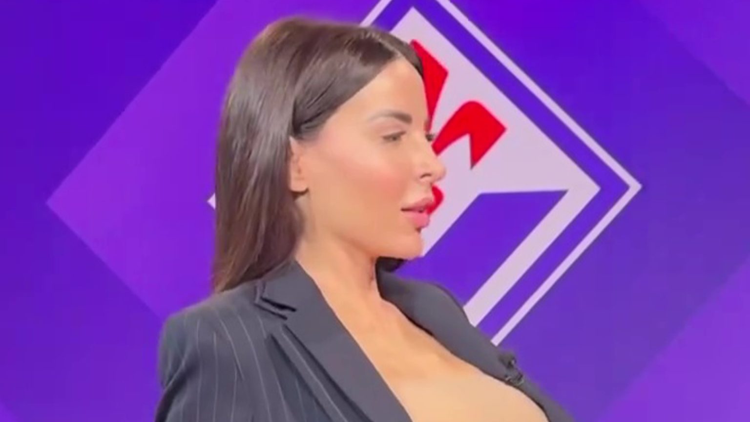 Kim Kardashian lookalike sports presenter risks wardrobe malfunction as she performs keepie-ups in daring outfit