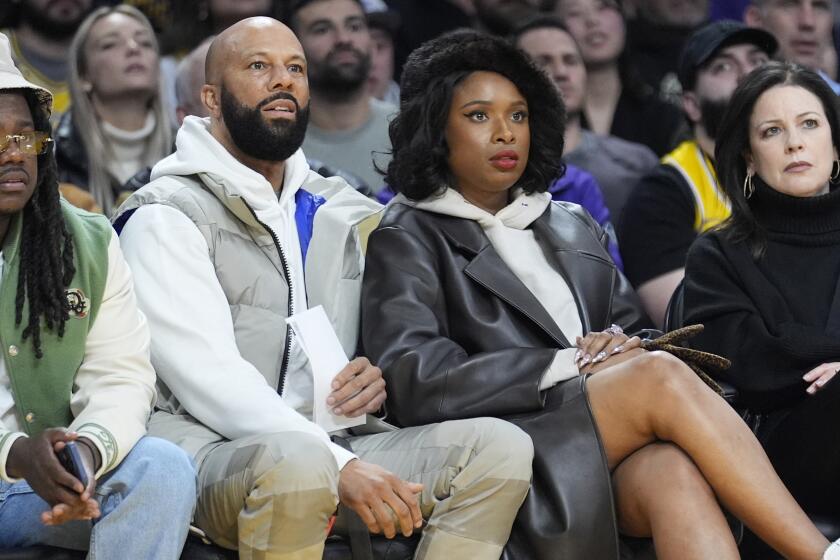 Jennifer Hudson gets nailed in the face sitting courtside with Common at a Knicks game