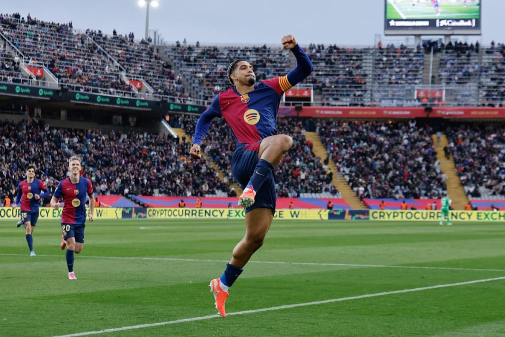 Barcelona routs 10-man Real Sociedad 4-0 to go top in Spain