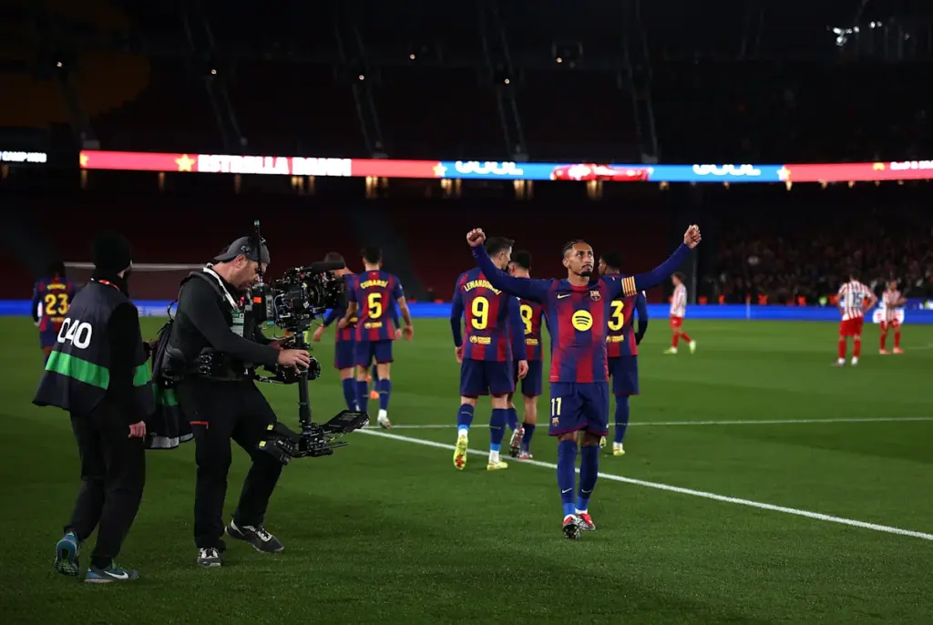 Barcelona stretch La Liga lead with battling victory over Atletico Madrid